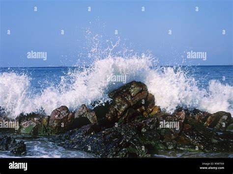 Sea Waves Hitting Rocks Splash Stock Photo Alamy