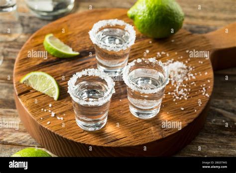 Alcoholic Tequila Shots With Lime And Salt Stock Photo Alamy