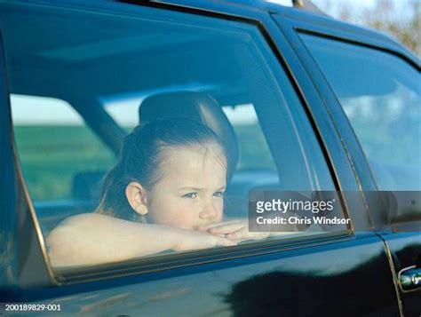 Girl In Car Window Photos And Premium High Res Pictures Getty Images