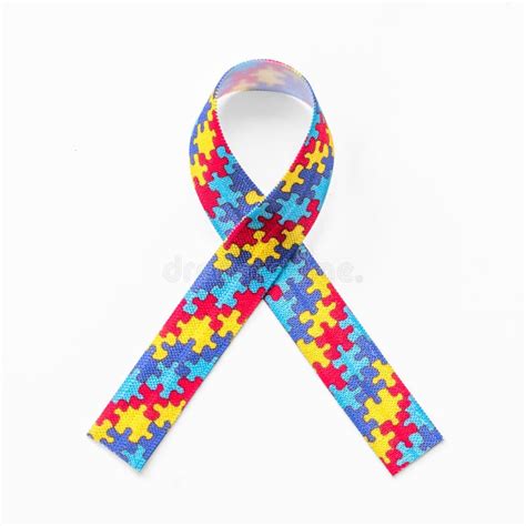 Autism Awareness Ribbon In Puzzle Or Jigsaw Pattern Isolated On White