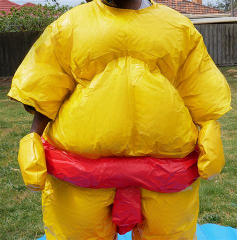 Two Pvc And Fabric Adult Sumo Suits With Helmets Gloves W 291cm Mat