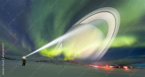 Northern lights (Aurora borealis) in the sky with Planet of Saturn ...