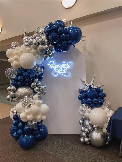 Yale Graduation Arch Backdrop With Balloon Garland By Capri Eros