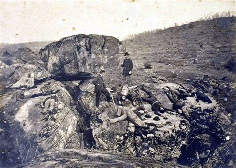 Staged photograph of posed "dead" soldiers in Devil's Den months after ...