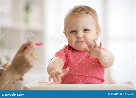 Little Baby Feeding with a Spoon Stock Image - Image of healthy, girl ...