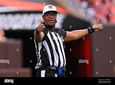 nfl referee ronald torbert stands   field   nfl preseason