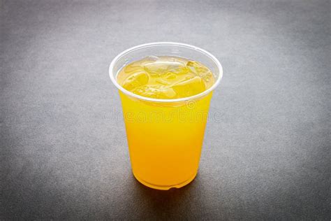 Orange Juice In Plastic Cup Stock Photo Image Of Juice Background