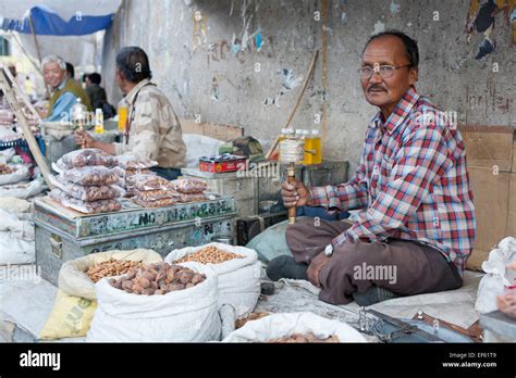 Leh Ladakh India The Main Bazaar Man With Prayer Wheel Selling