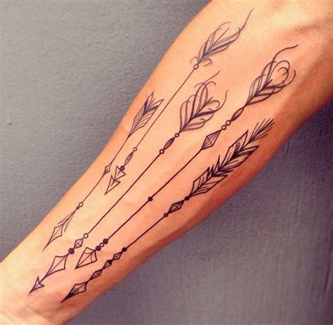 Five beautiful indian arrow tattoo with beads - Tattooimages.biz