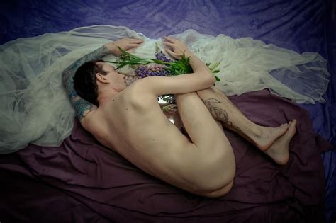 Premium Photo Naked Man Holding A Bouquet