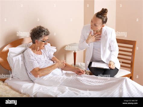 Old Woman With Senior Social Work Assistant Stock Photo Alamy