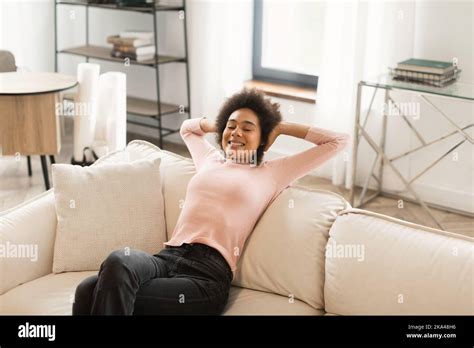 Happy Relaxed Pretty Young African American Lady With Closed Eyes