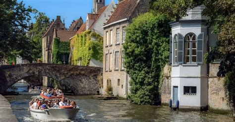 Bruges Guided Walking Tour And Canal Boat Trip Getyourguide