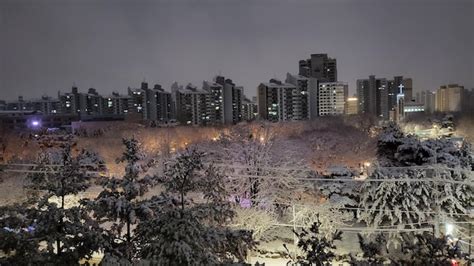 Premium Photo | A city on a snowy night