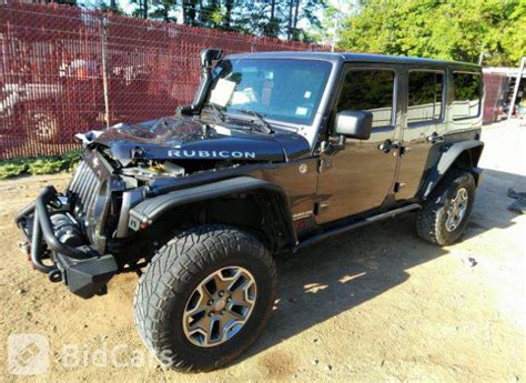 2014 Jeep Wrangler Unlimited Rubicon 1C4HJWFG7EL256844 Bid History