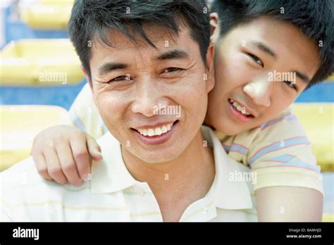 Father And Son Smiling Stock Photo Alamy