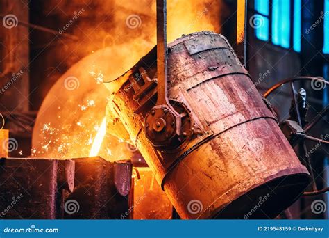 Molten Metal Pour From Ladle Into Sand Mold Iron Casting Process In