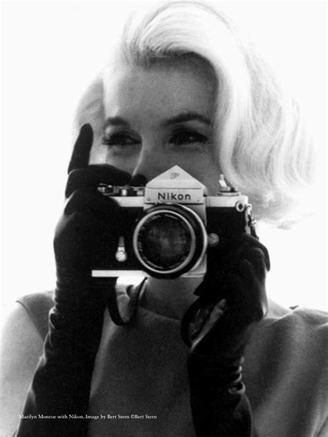 Marilyn Monroe Holding A Nikon F Body 35mm Single Lens Reflex Camera