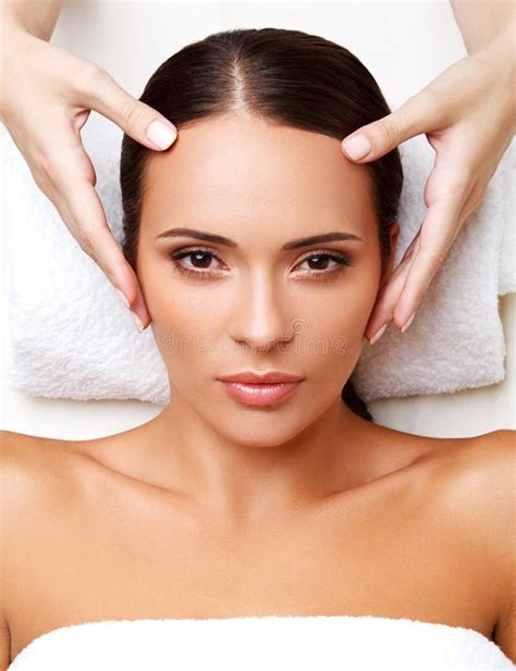 Face Massage Close Up Of A Young Woman Getting Spa Treatment Stock