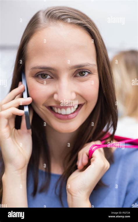 Pretty Brunette Talking On The Phone Stock Photo Alamy