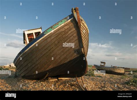 Abandoned Fishing Boats On Shingle Beach Dungeness Kent England