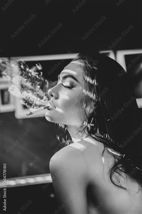 Sexy Lady Smoking At The Window Modeling Black And White Art Photograph