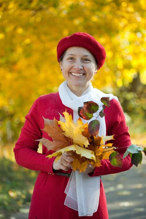 Mature Woman In Autumn Park Stock Photo Image Of White Fall