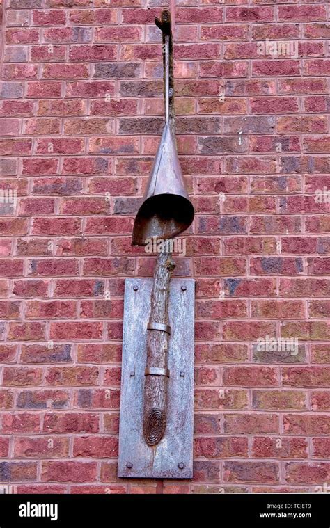 Unique Street Light Protruding From A Brick Wall Stock Photo Alamy