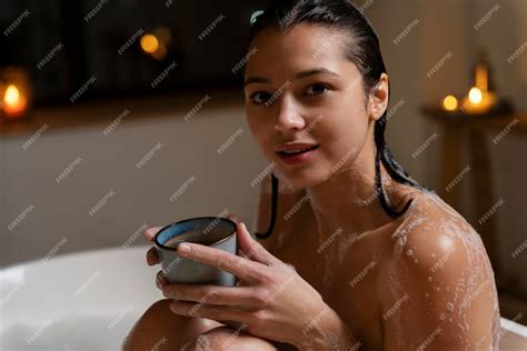 Free Photo Young Woman Drinking Coffee While Taking A Bath