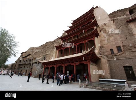 File Tourists Visit Mogao Caves Or Mogao Grottoes In Dunhuang