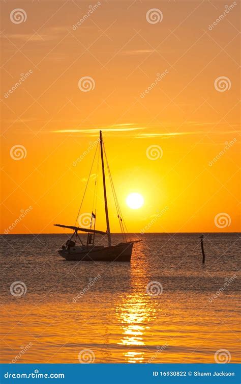 Yacht sailing at sunset stock photo. Image of details - 16930822