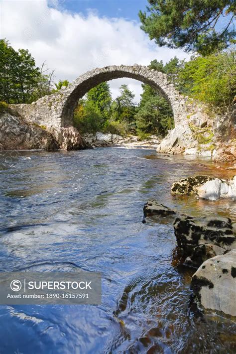 Carrbridge, oldest stone bridge in the Highlands, Scotland, United Kingdom, Europe - SuperStock