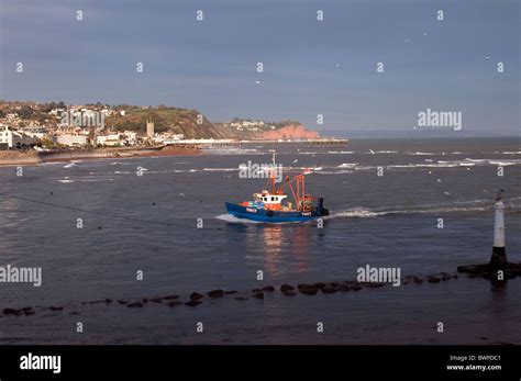 Trawler Th117 Entering Teignmouth Harboura View Of The Seaside Resort