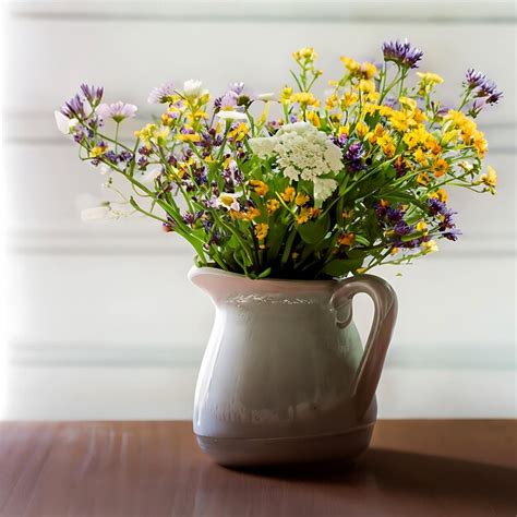 Premium Ai Image Bouquet Of Wild Flower In A Jug