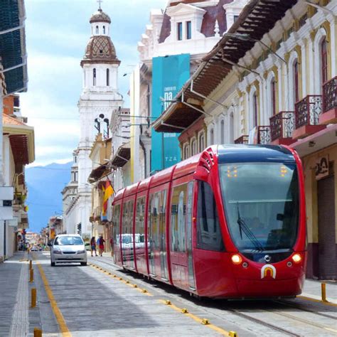 Red Tram Pictured In Old Town Cuenca Ecuador South America Travel