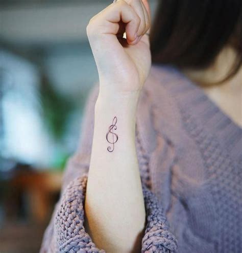 Meaningful Treble Clef Tattoo Designs For Music Lovers