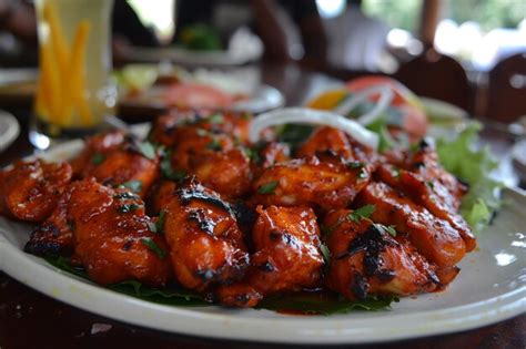 Spicy Tandoori Chicken Dish Premium Ai Generated Image