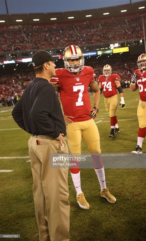 Head Coach Jim Harbaugh of the San Francisco 49ers talks with Colin... | Harbaugh, San francisco ...