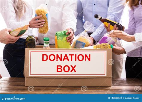 Group of People Donating Food Stock Photo - Image of product, help: 147800516