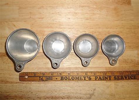 Vintage Measuring Cups 4 Piece Set | Collectors Weekly