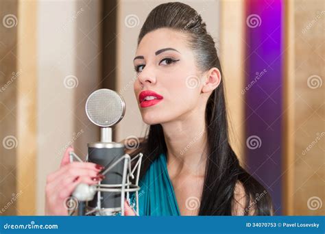 Girl With Beautiful Eyes Holds The Microphone Stock Image Image Of