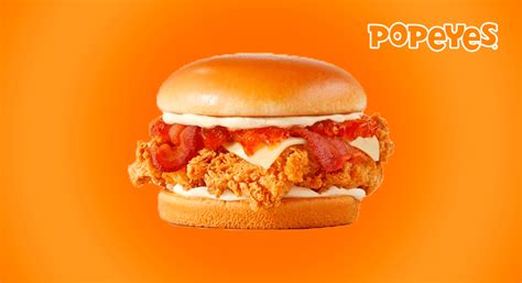 Popeyes lança novo sanduíche Bacon Vibrante GKPB Geek Publicitário