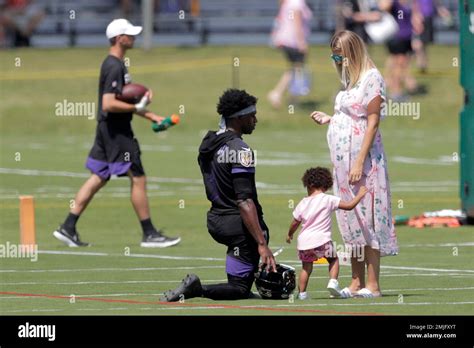 Baltimore Ravens Quarterback Robert Griffin Iii Left Talks To His Wife Grete Sadeiko And