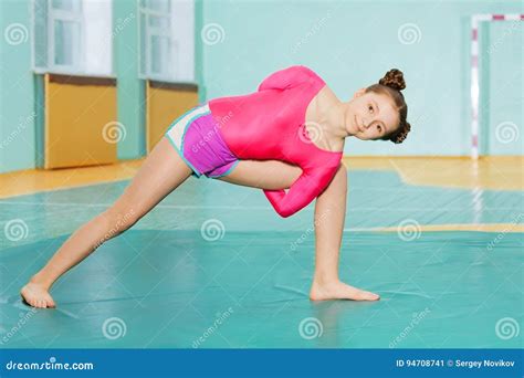 Cute Preteen Girl Doing Stretching Exercise On Mat Stock Image Image