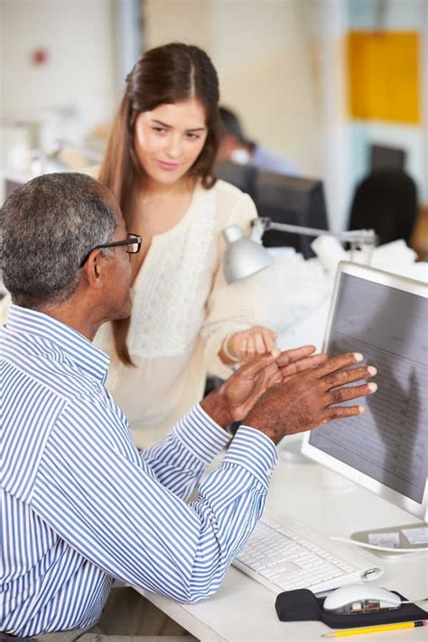 Workers At Desks In Busy Creative Office Stock Image Image Of