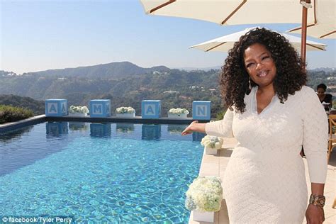 Tyler Perry Throws Christening For Son Aman And Names Oprah Winfrey As