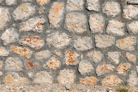 Textura Hermosa De Una Pared Antigua De Piedras Anaranjadas Con Grietas