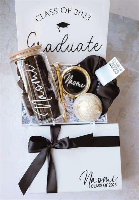 A Graduation Gift Box Filled With Personalized Items