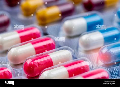 Selective Focus On Pink White Antibiotic Capsule Pills In Blister Pack