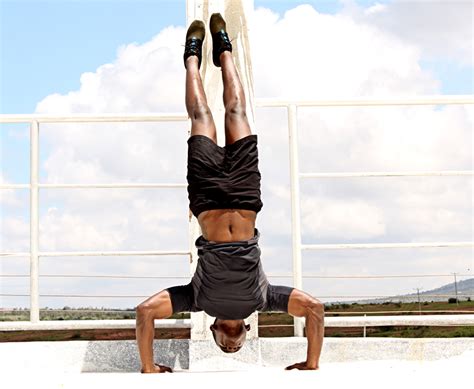 Strong Black Man Doing Handstand Push Ups Outdoors High Quality Free